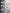An e-commerce social proof marketing banner layout for a luxury hair care brand with a 3:4 aspect ratio. The right side features the small-sized product bottle from the reference image standing elegantly on a minimalist concrete pedestal under beautiful, direct cinematic sunlight with soft shadows of clean leaves. The entire left side of the 3:4 frame seamlessly transitions into a smooth, natural dark grey-to-transparent gradient fade vignette overlay. Inside this soft dark fade, three massive bold metrics 